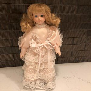 Blonde Hair/Blue Eyed Porcelain Doll in Pink Satin and Lace Dress